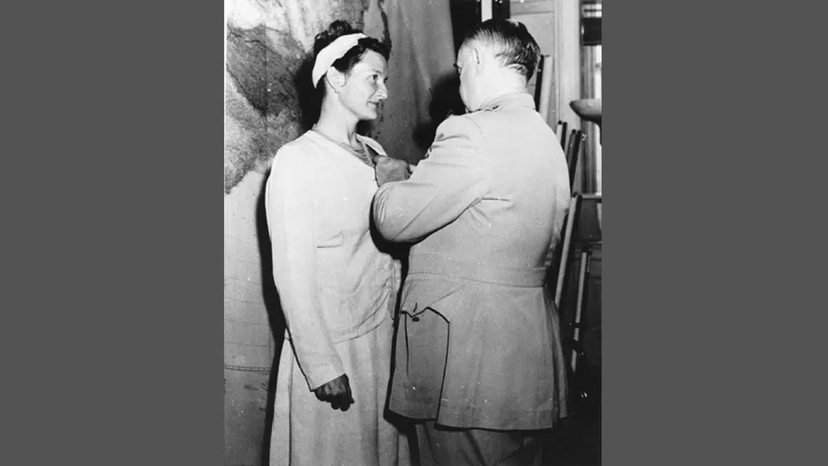 black and white image of Virginia Hall Special Operations Branch receiving the Distinguished Service Cross Sept 1945