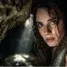close up of Echidna from Greek mythology, beautiful woman from the waist up in a dark cave