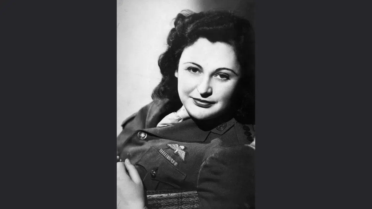 black and white photo of a women in WWII with dark hair in 1945